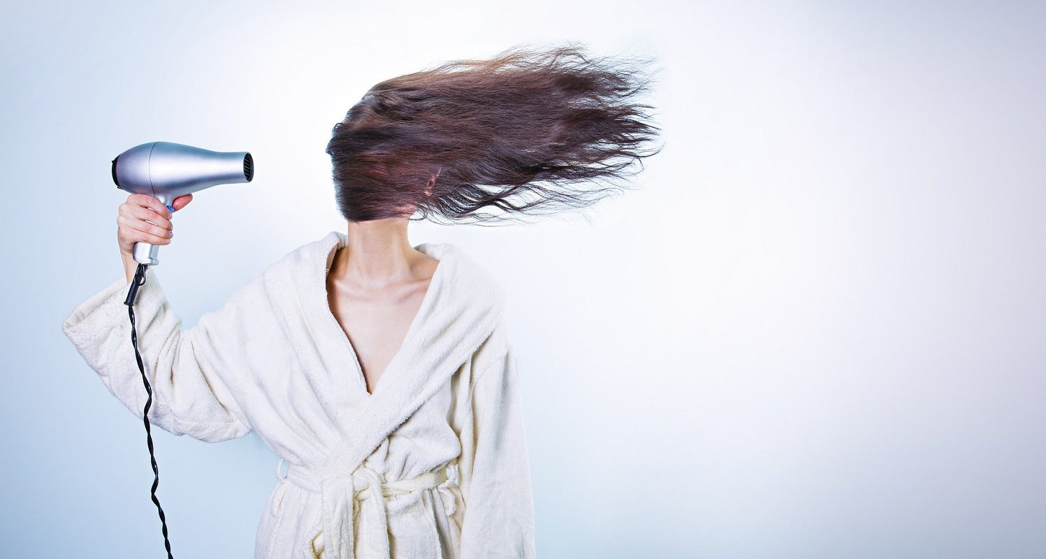 Woman Drying Her Hair